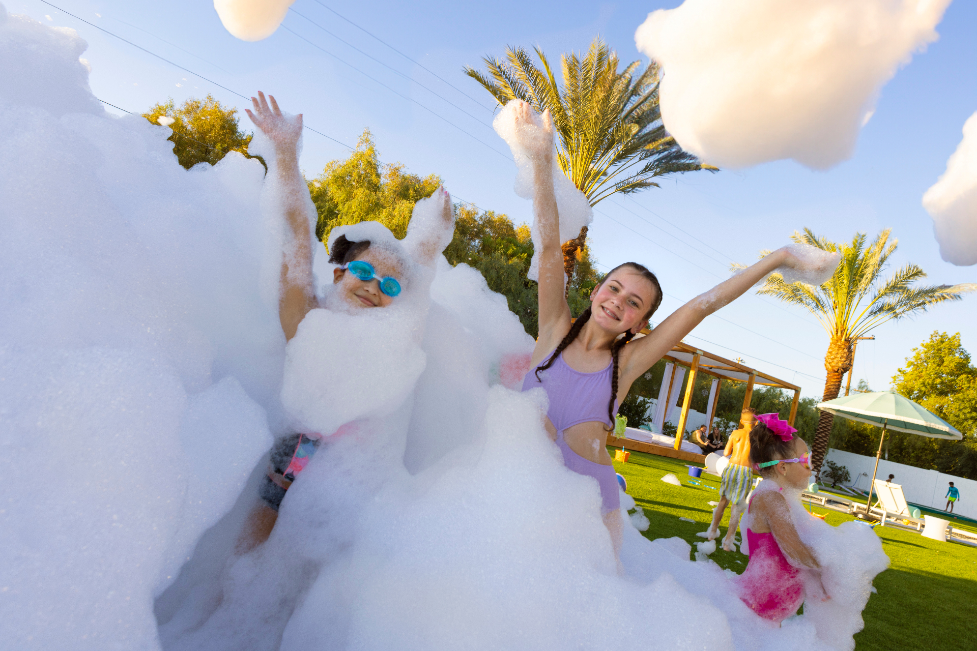 Commercial foam cannon spraying foam at a party
